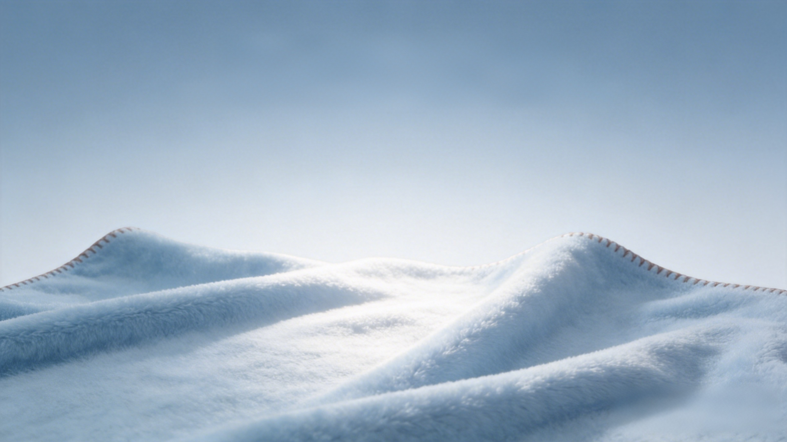Ocean Hush blue blanket spread in soft light